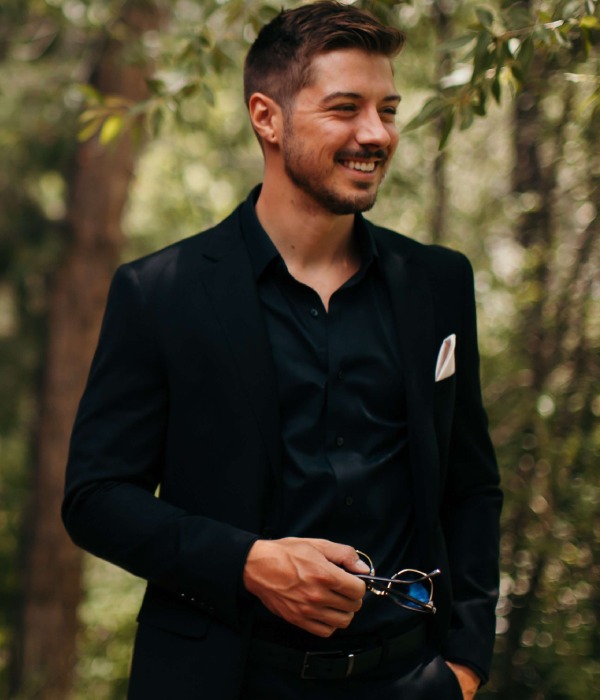 Portrait of Mysterious Man in Dark Suit and Leather Gloves on Black  Background. Vintage Style and Retro Fashion. Stock Photo | Adobe Stock