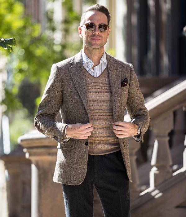 A Classic Vintage Look For Men Revolves Around V-neck Sweaters