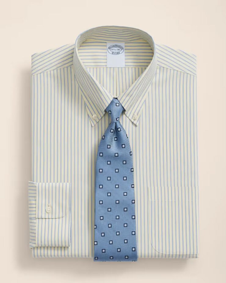 Wearing the most unique dress shirt and the necktie.